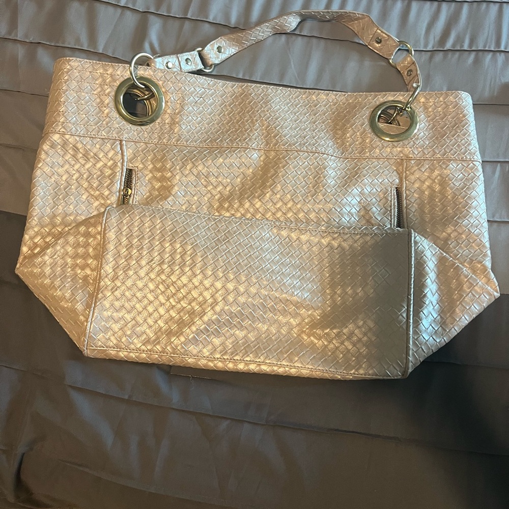 Beautiful Steve Madden, travel bag, diaper bag, or whatever you need it for.